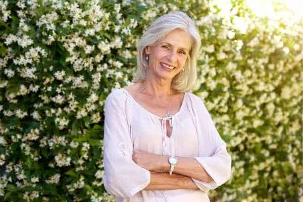 Older woman happy with urinary incontinence treatment Lower Place